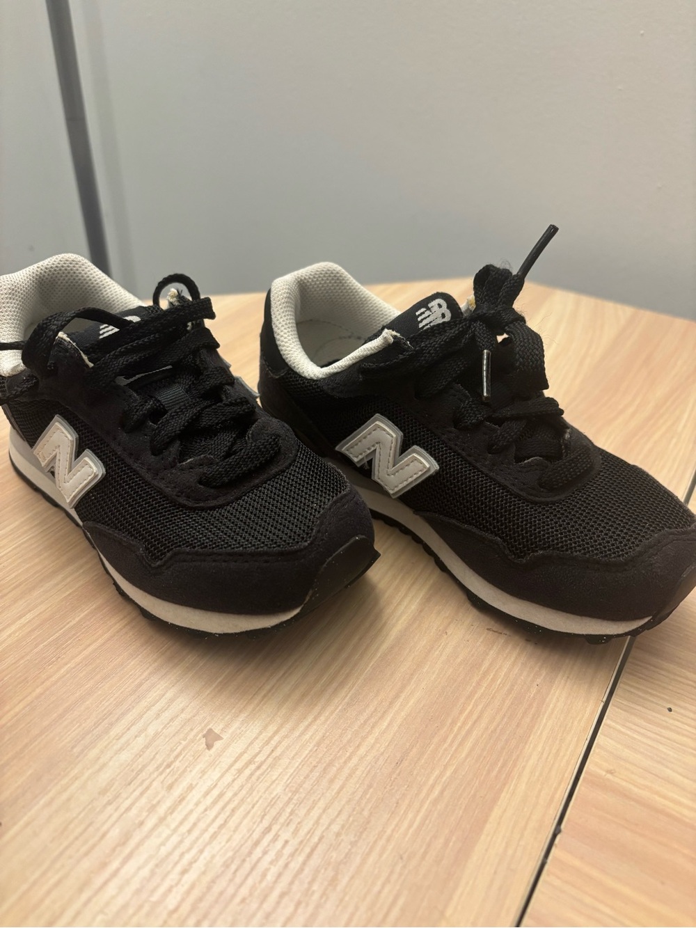 New Balance Kids Black and White Classic Sneakers